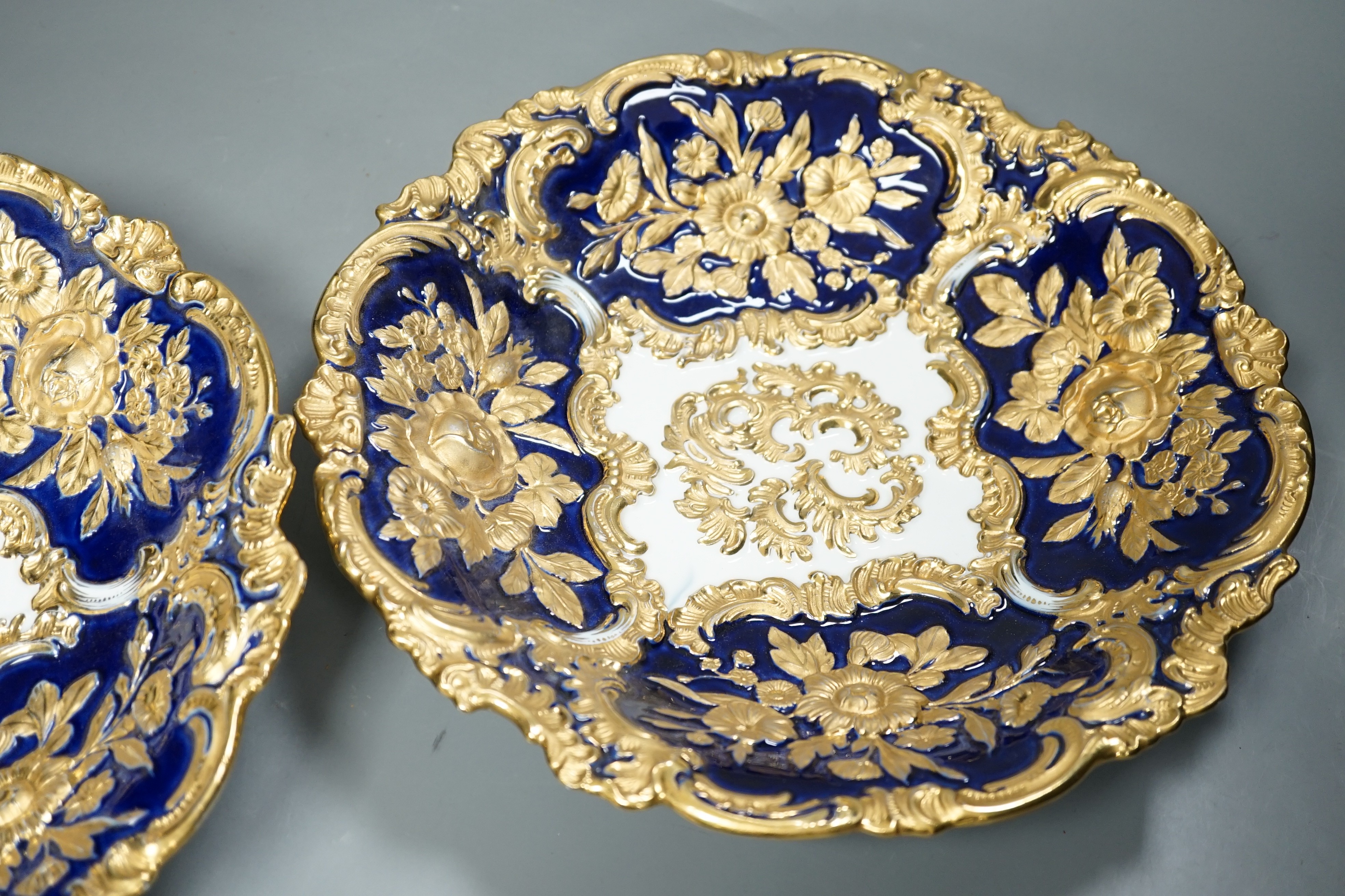 A pair of Meissen moulded wall plates, late 19th/early 20th century, 30.5cm diameter